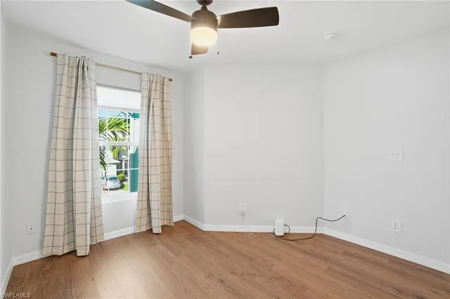 a kitchen with storage and utility