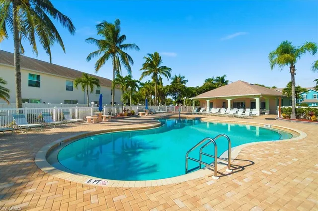 a view of a dining room with furniture and a dining table
