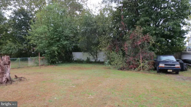 a car parked in front of a house