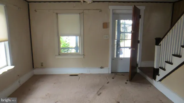 an empty room with windows