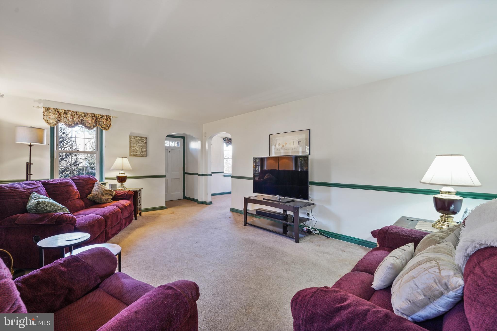 24 Providence Road Morton, PA 19070 - Photo 10 of 27 Loving rm- HW under carpet