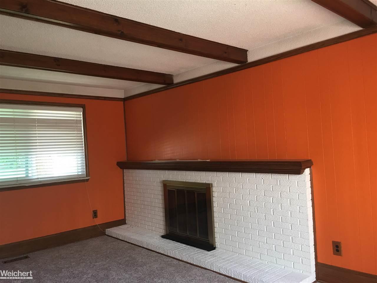 30505 Hayes Road Warren, MI 48088 - Photo 19 of 33 Wood beams line the ceiling of the great room
