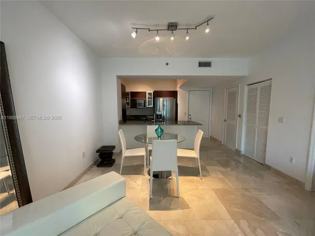 a view of a dining room with furniture