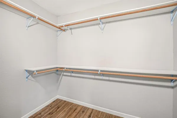 a view of a room with racks on the wall