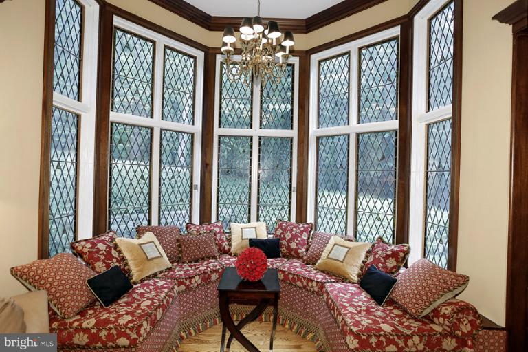 11218 River View Drive Potomac, MD 20854 - Photo 1 of 24 a living room with furniture and a large window
