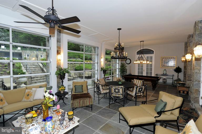 11218 River View Drive Potomac, MD 20854 - Photo 12 of 24 a living room with furniture and a large window