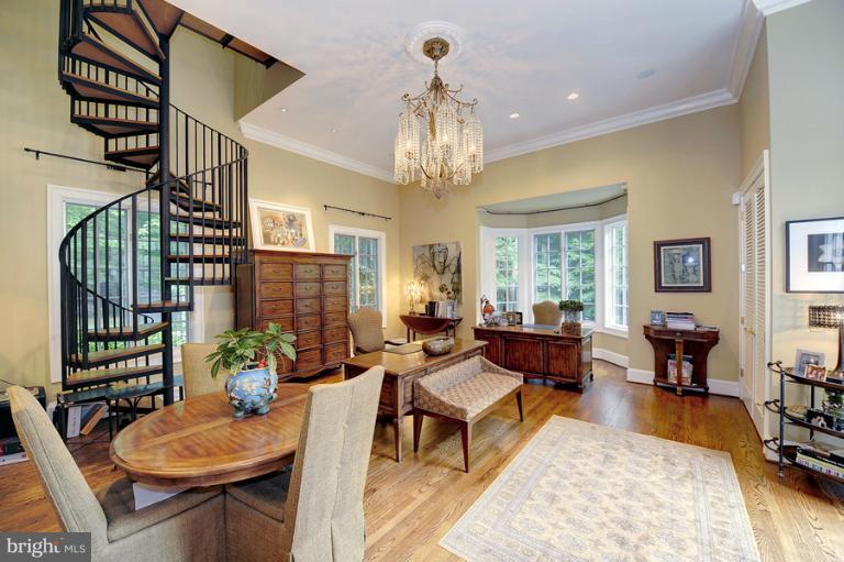 11218 River View Drive Potomac, MD 20854 - Photo 13 of 24 a living room with furniture or couch and a chandelier
