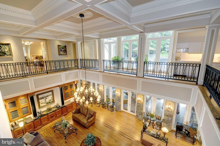 11218 River View Drive Potomac, MD 20854 - Photo 14 of 24 a view of a living room and dining room