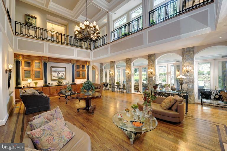 11218 River View Drive Potomac, MD 20854 - Photo 15 of 24 a living room with furniture or chandelier and a large window