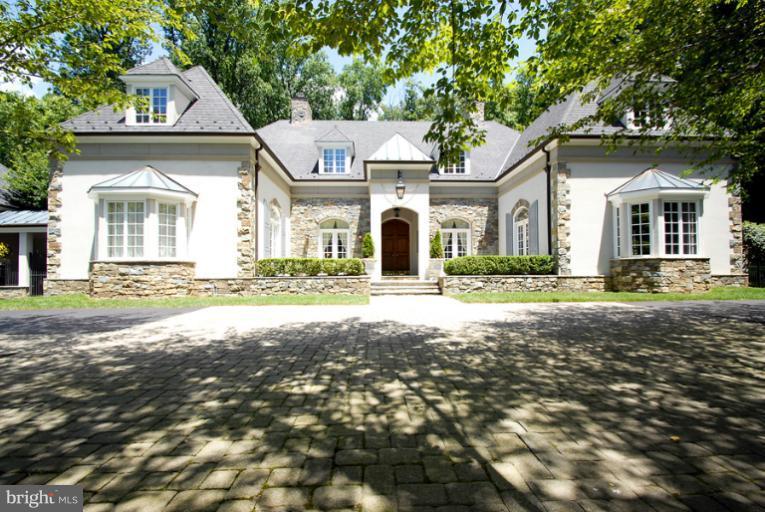 11218 River View Drive Potomac, MD 20854 - Photo 24 of 24 a front view of a house with a yard