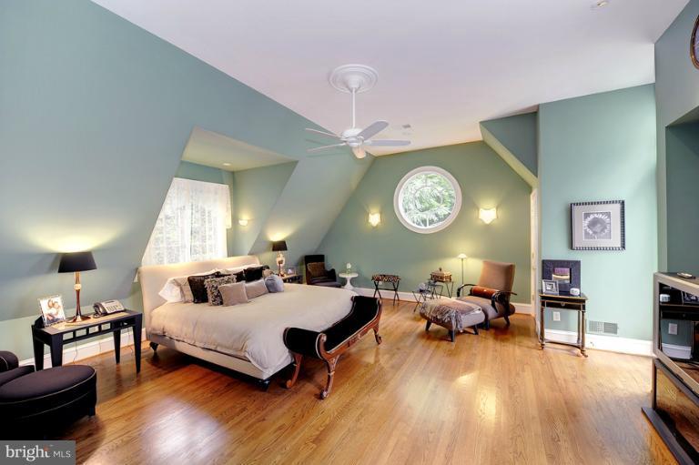 11218 River View Drive Potomac, MD 20854 - Photo 10 of 24 a living room with furniture and a large window