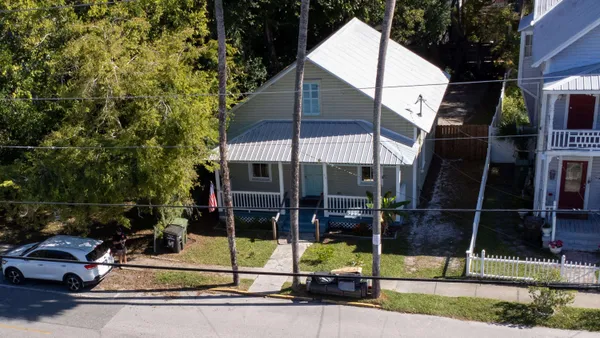 a view of street with sitting area