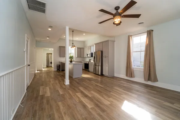 a view of a electric appliances in kitchen and a window