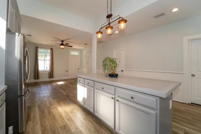 a view of cabinets and wooden floor