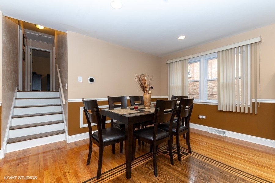 2605 West 83rd Place Chicago, IL 60652 - Photo 6 of 14 a view of a dining room with furniture and wooden floor