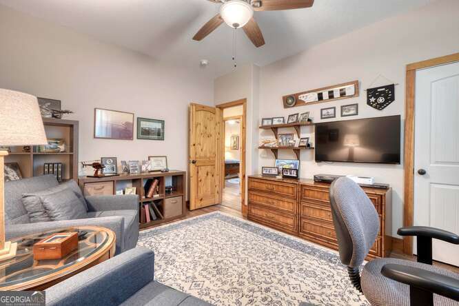 85 Minstead Ridge Young Harris, GA 30582 - Photo 14 of 50 a living room with furniture and a flat screen tv