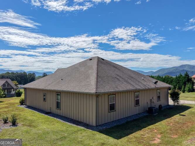 85 Minstead Ridge Young Harris, GA 30582 - Photo 19 of 50 a view of a house with a yard