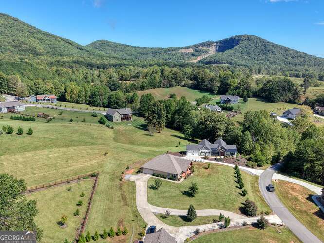 85 Minstead Ridge Young Harris, GA 30582 - Photo 24 of 50 a view of a swimming pool with a yard