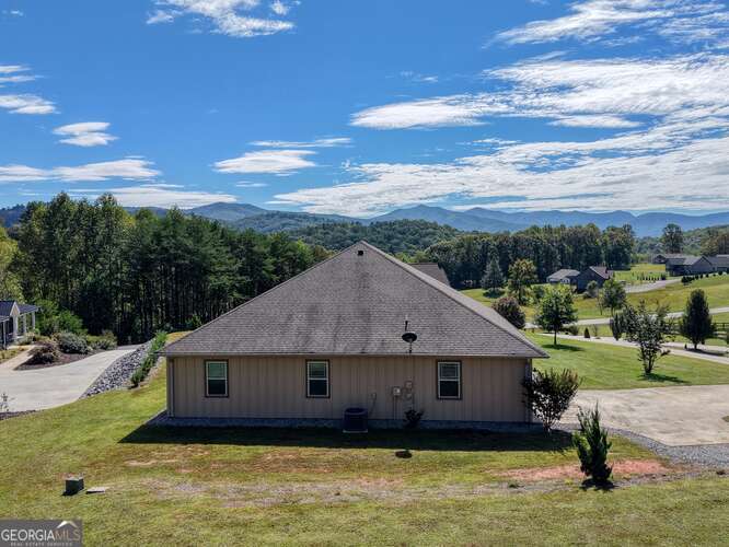 85 Minstead Ridge Young Harris, GA 30582 - Photo 39 of 50 a house with trees in the background