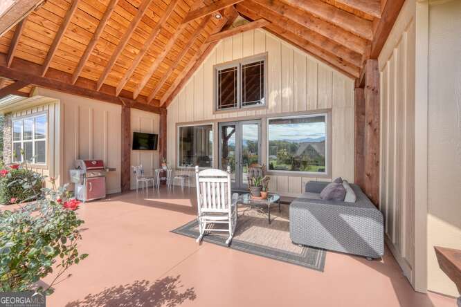 85 Minstead Ridge Young Harris, GA 30582 - Photo 9 of 50 a building outdoor space with patio furniture and potted plants
