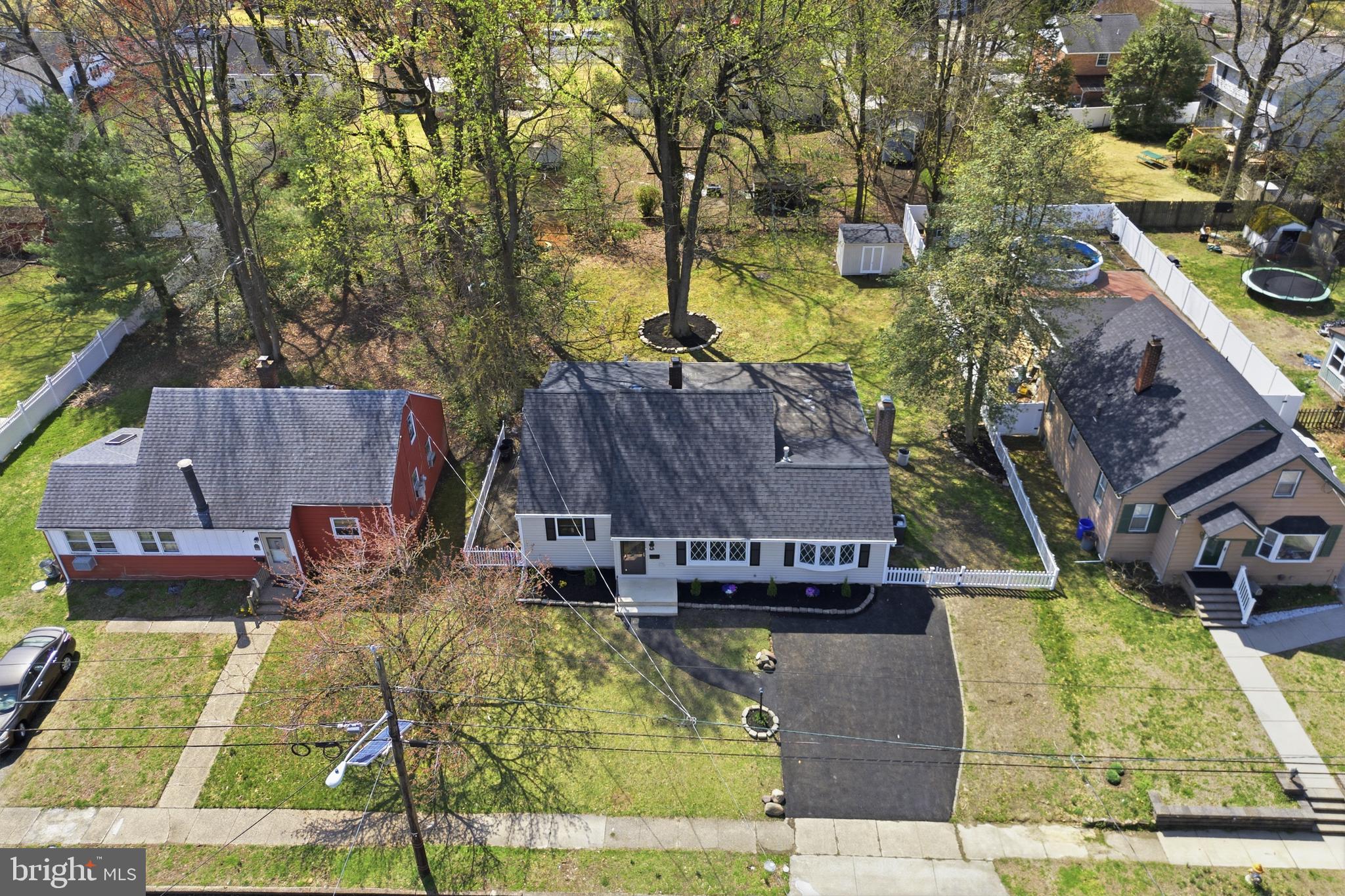443 High Street Woodbury, NJ 08096 - Photo 1 of 28 an aerial view of a house with swimming pool