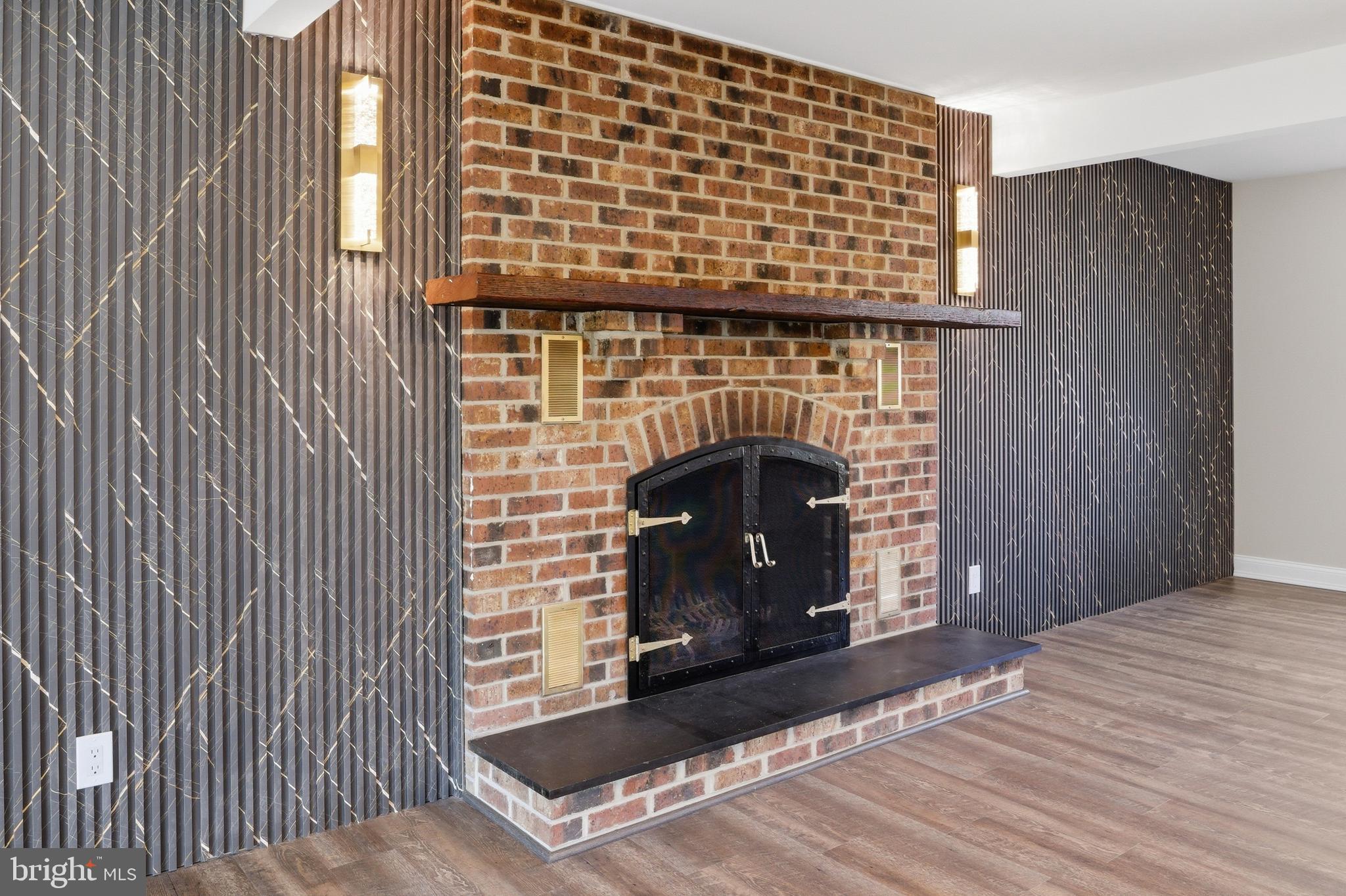 443 High Street Woodbury, NJ 08096 - Photo 14 of 28 a view of an empty room with a fireplace