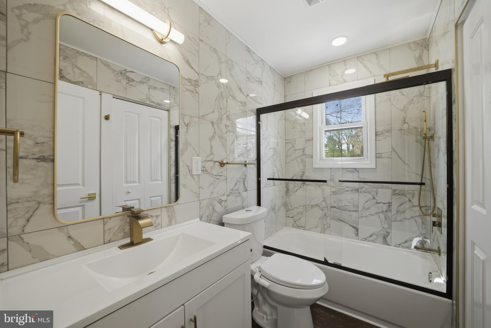 443 High Street Woodbury, NJ 08096 - Photo 16 of 28 a bathroom with a sink toilet and shower