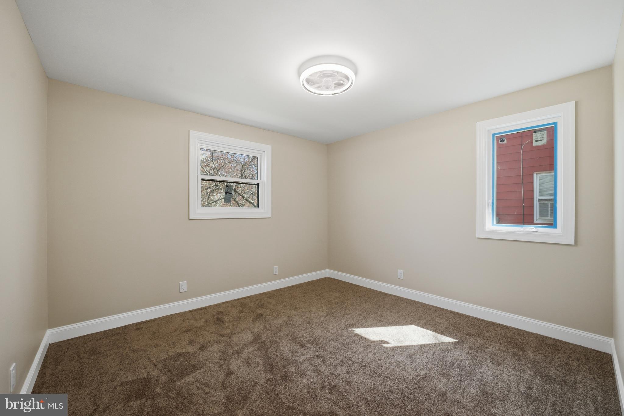 443 High Street Woodbury, NJ 08096 - Photo 17 of 28 an empty room with a window