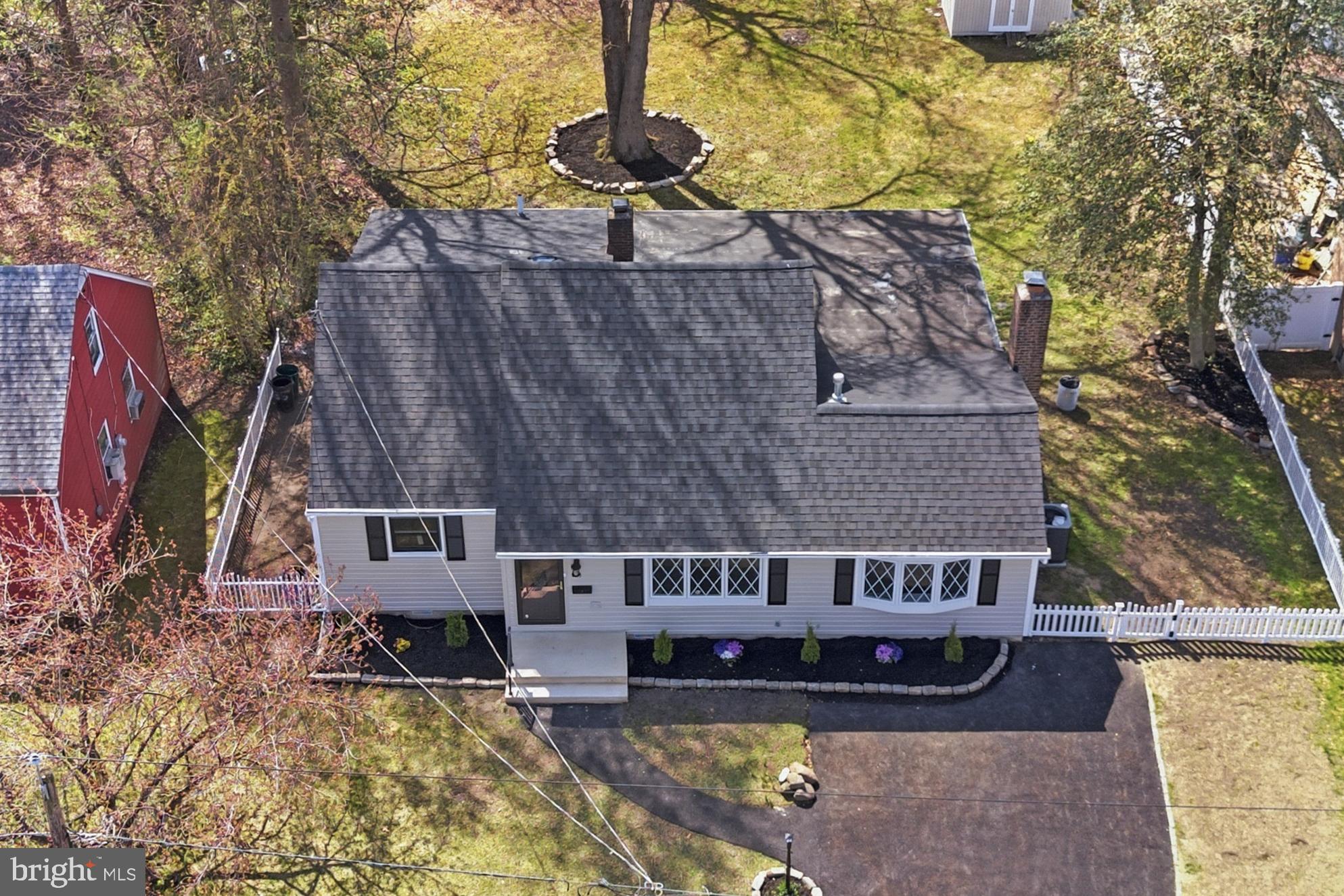 443 High Street Woodbury, NJ 08096 - Photo 2 of 28 a view of a house with a yard