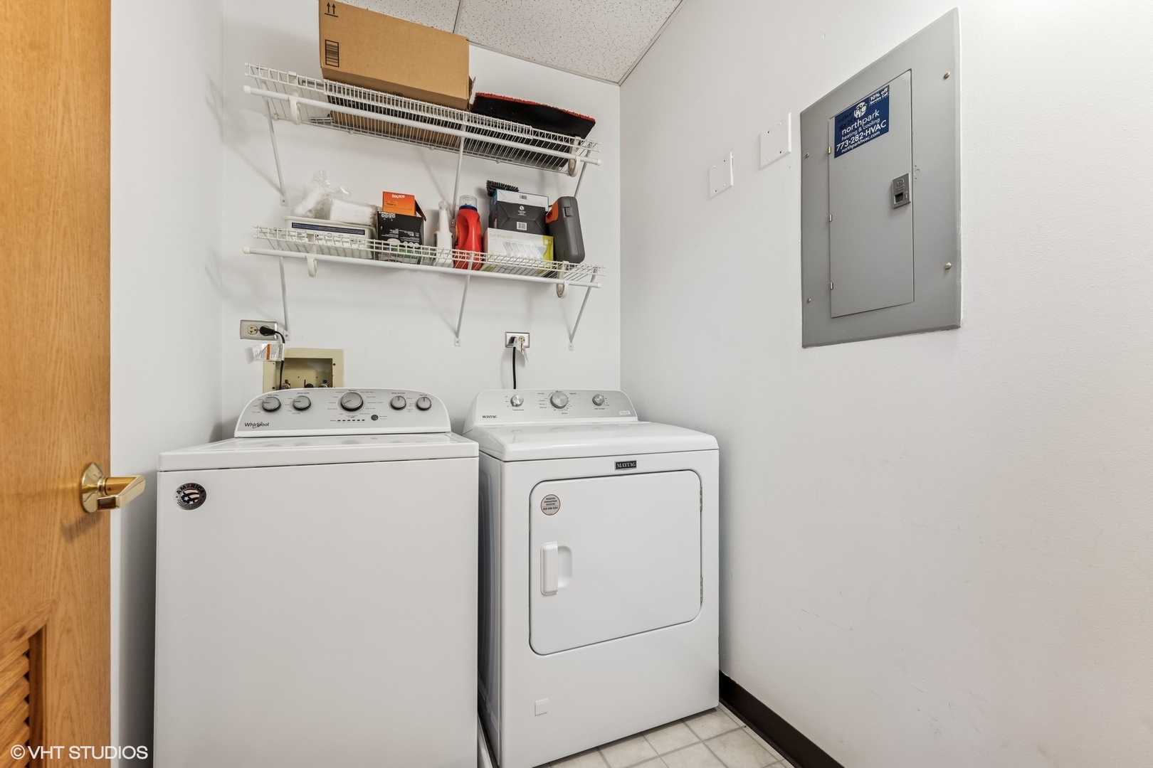 910 South Michigan Avenue, Unit 710 Chicago, IL 60605 - Photo 12 of 17 a utility room with dryer and washer