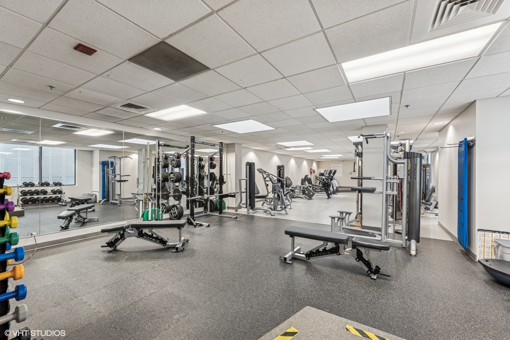 910 South Michigan Avenue, Unit 710 Chicago, IL 60605 - Photo 14 of 17 a view of a room with gym equipment