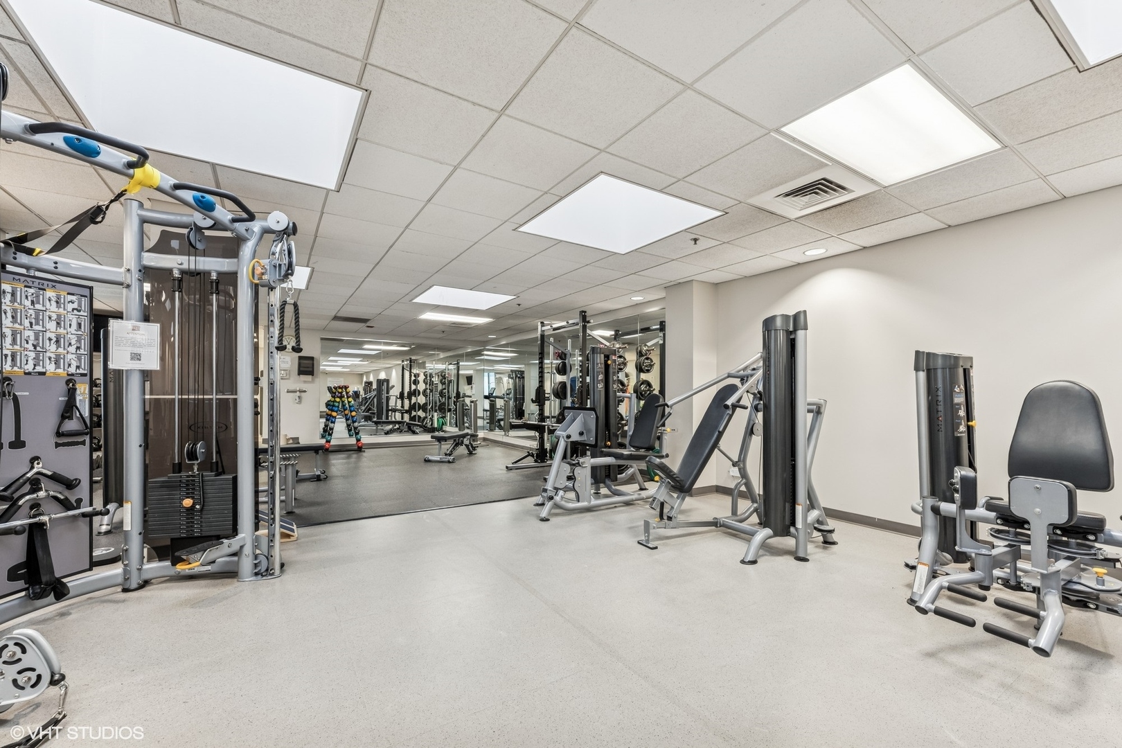 910 South Michigan Avenue, Unit 710 Chicago, IL 60605 - Photo 15 of 17 a view of a room with gym equipment