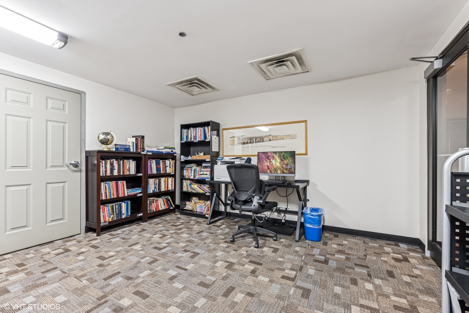 910 South Michigan Avenue, Unit 710 Chicago, IL 60605 - Photo 16 of 17 a view of a workspace with furniture