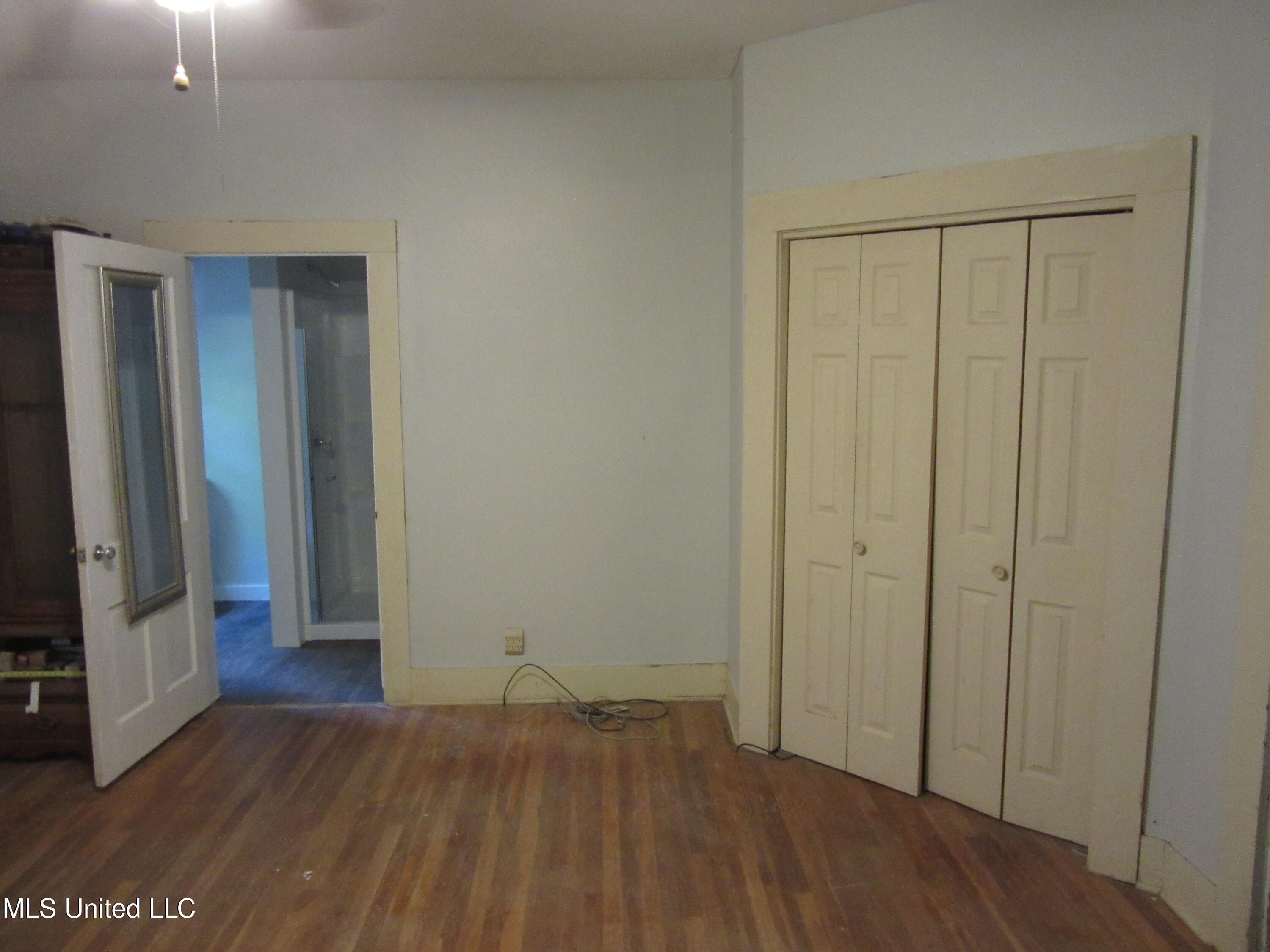 706 6th Street Inverness, MS 38753 - Photo 9 of 17 master with view of bathroom entrance