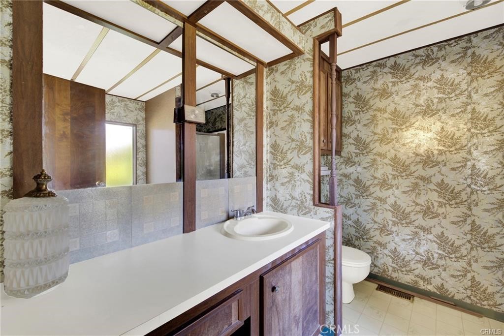 3835 Gardiner Ferry Road, Unit 3 Corning, CA 96021 - Photo 11 of 20 a bathroom with a sink and a mirror