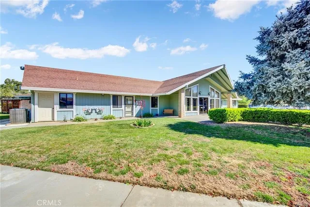 a view of a street with a sign board
