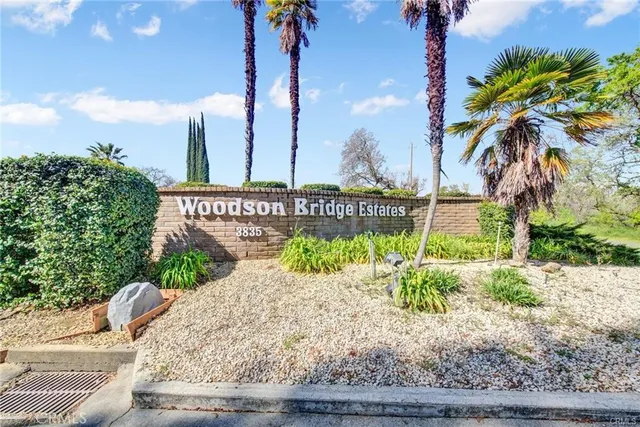 a view of a room with large windows