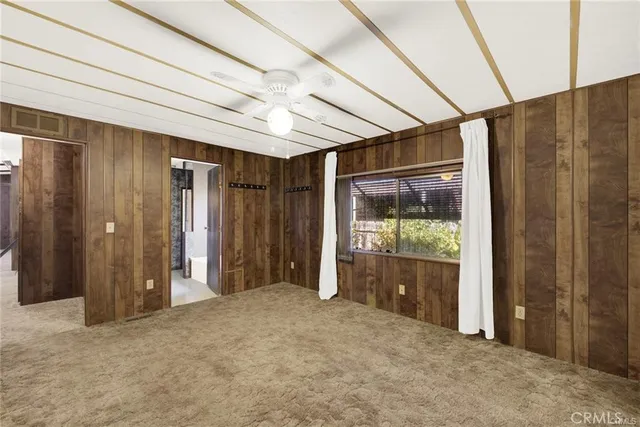 a bathroom with a sink a toilet and a shower