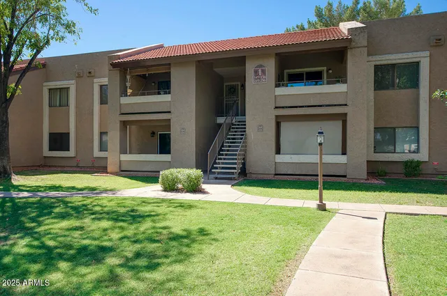 a house view with a garden space