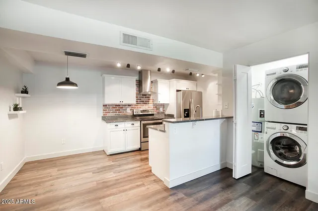 a view of kitchen and washer and dryer