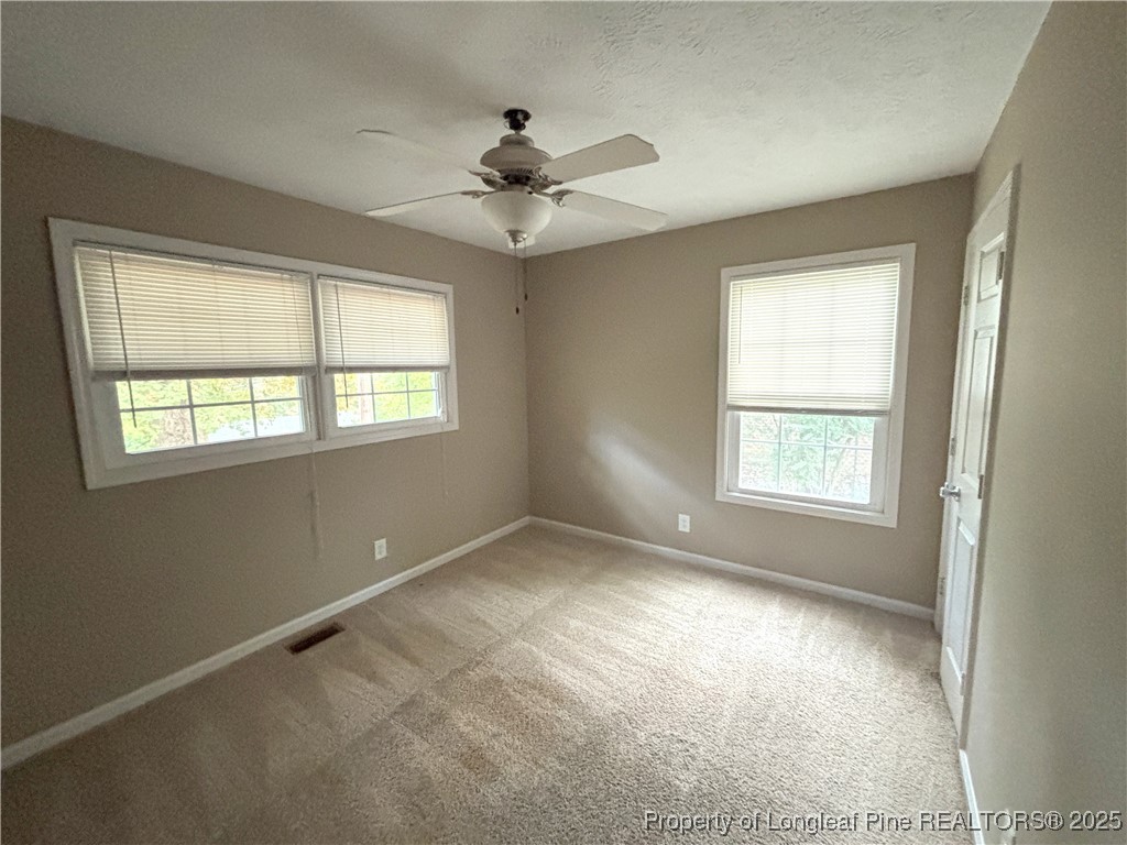 229 Lansdowne Road Fayetteville, NC 28314 - Photo 13 of 18 a view of an empty room with a window