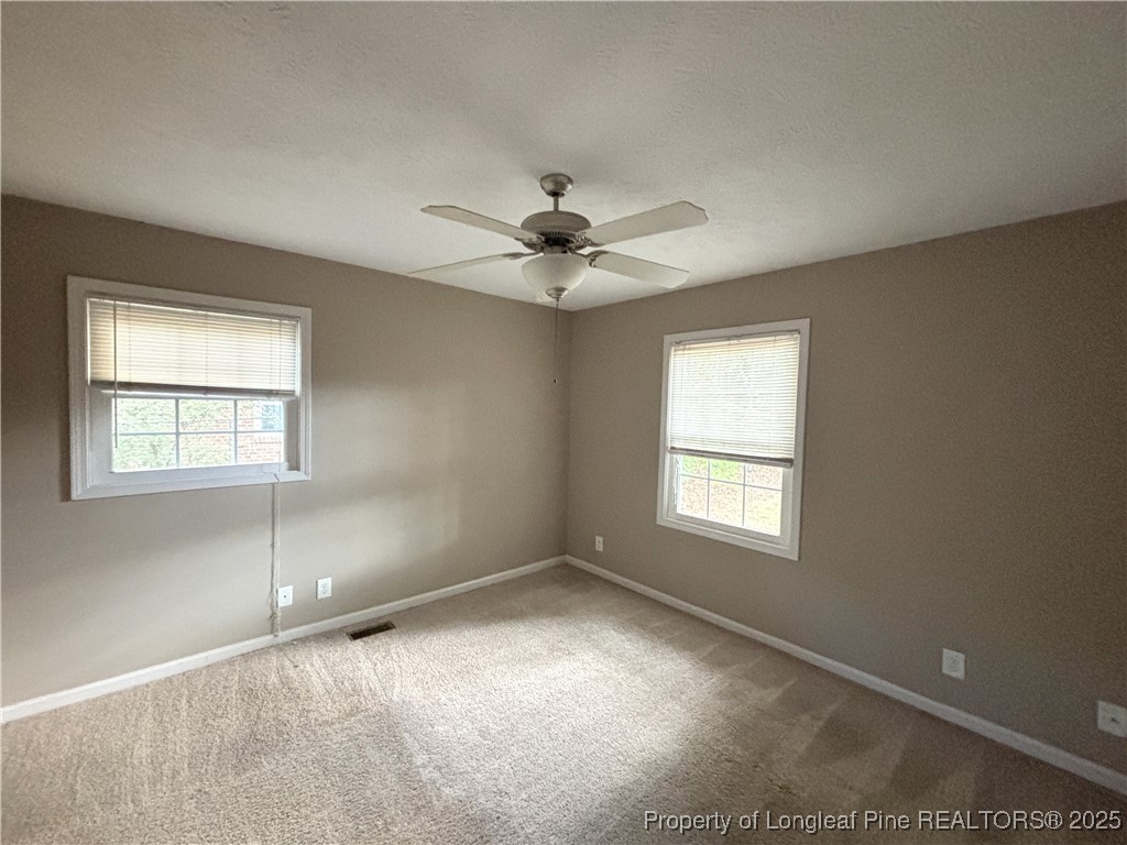 229 Lansdowne Road Fayetteville, NC 28314 - Photo 15 of 18 a view of an empty room with a window