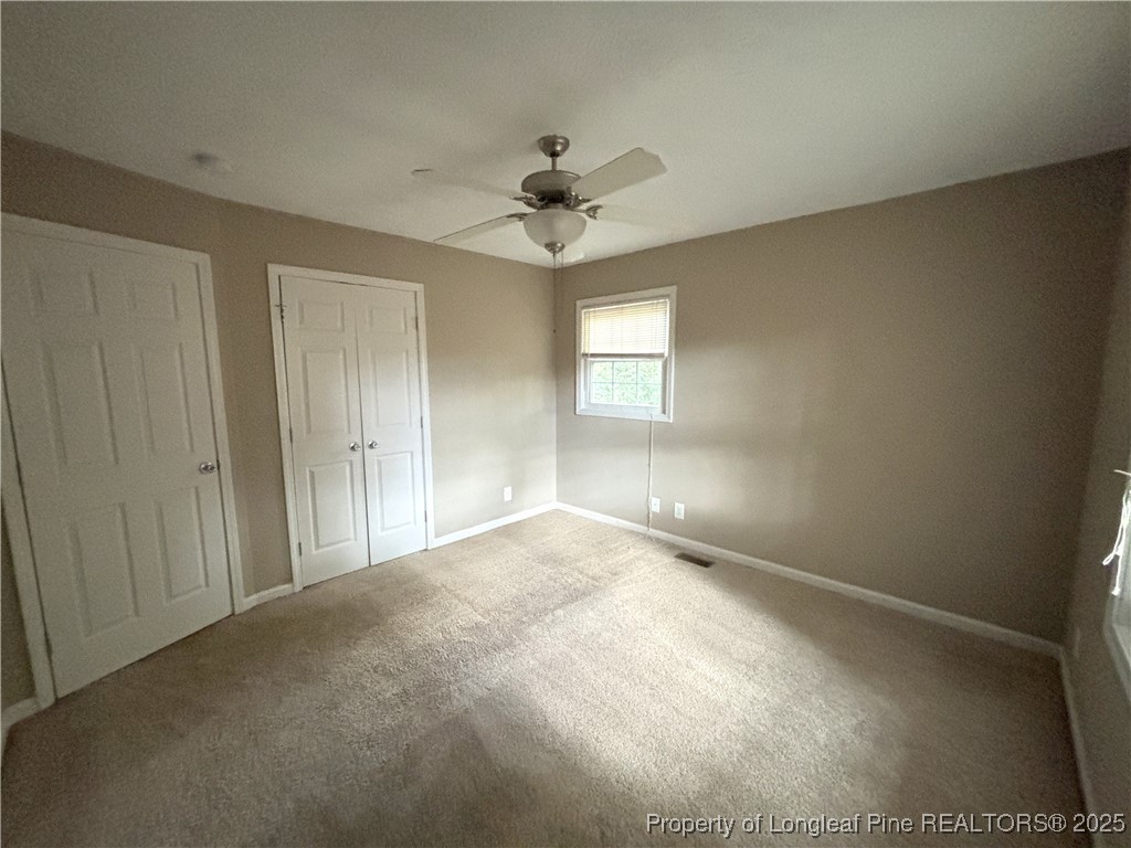 229 Lansdowne Road Fayetteville, NC 28314 - Photo 16 of 18 a view of an empty room with a window