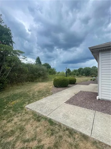 a view of backyard of house