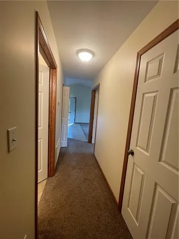 an empty room with closet area