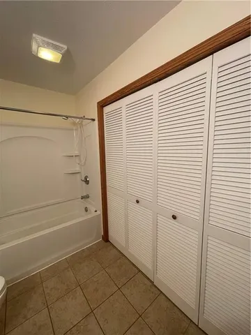 a view of a lake with a yard