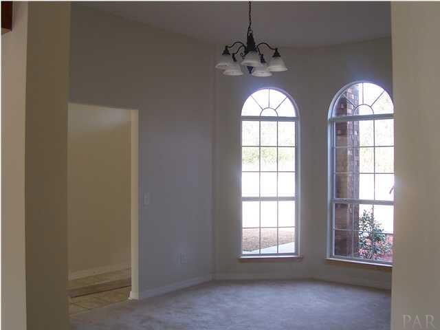 2248 Liberty Loop Road, Unit 19D Cantonment, FL 32533 - Photo 7 of 24 formal dining room