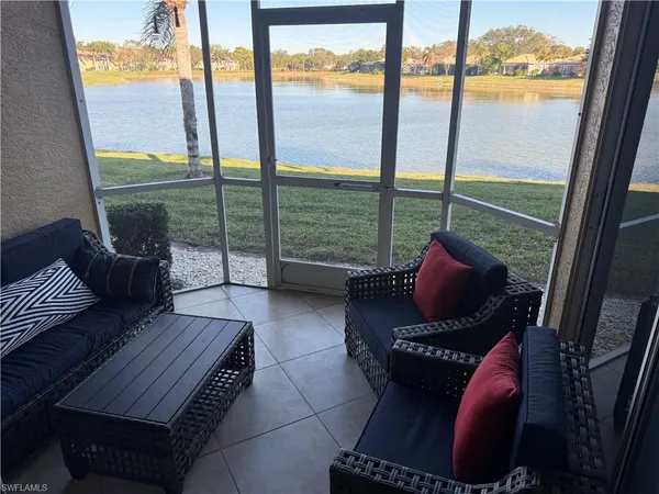 a living room with large windows