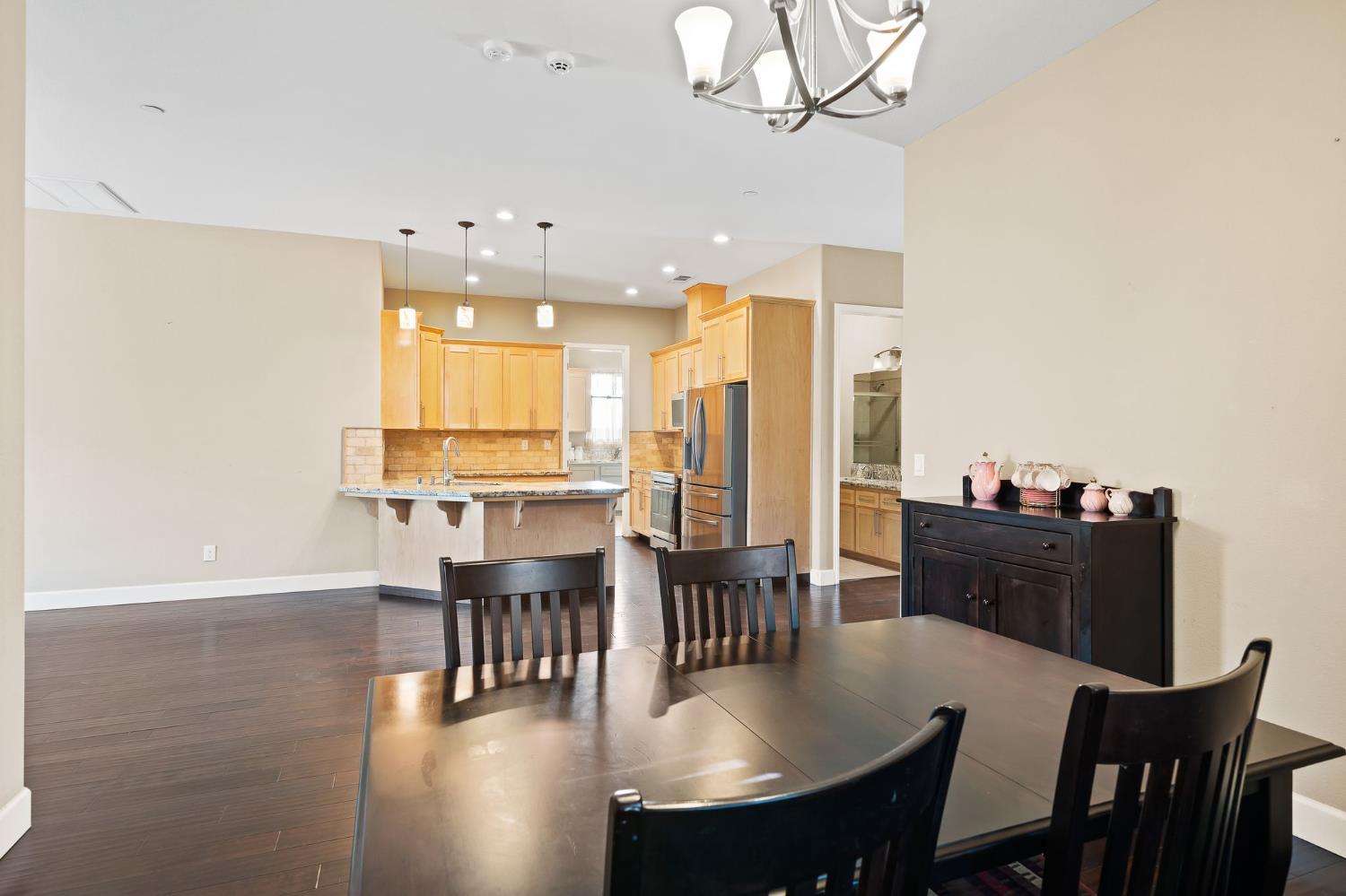 209 Fall Avenue Patterson, CA 95363 - Photo 21 of 48 a view of a dining room with furniture window and wooden floor