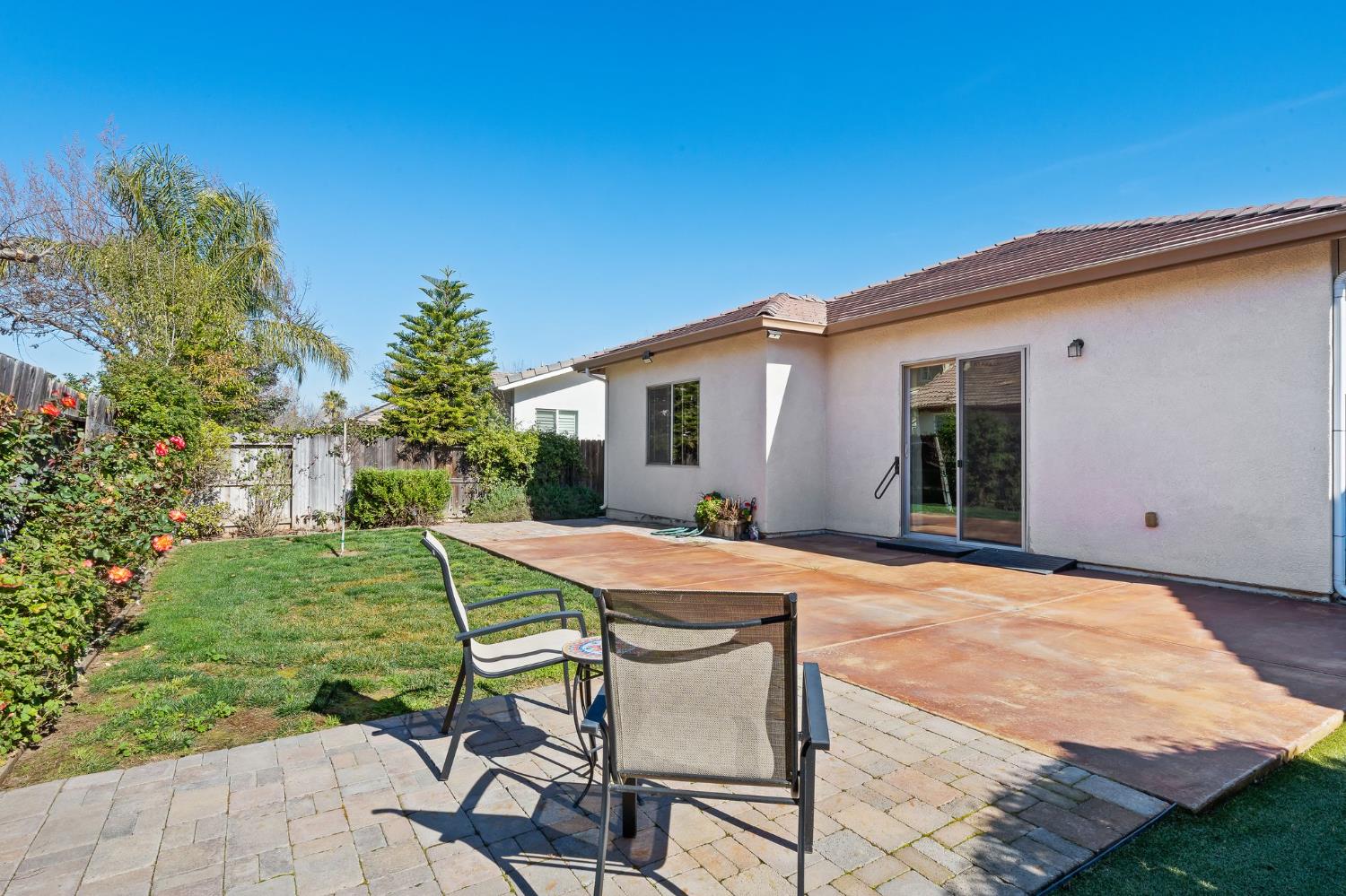 209 Fall Avenue Patterson, CA 95363 - Photo 34 of 48 a house with swimming pool in front of it